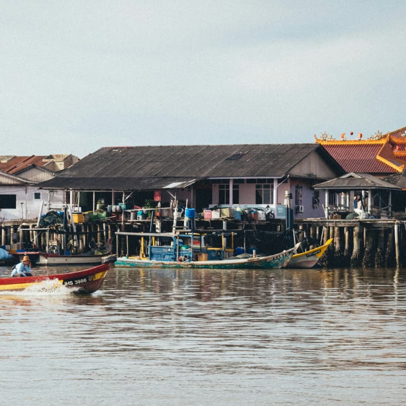 Traditional fishing village and boats in Kukup Johor